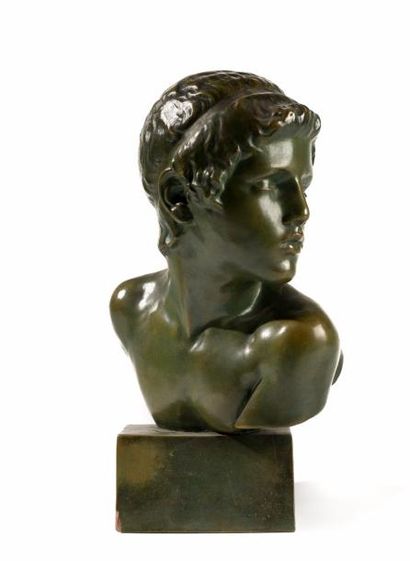 Constant ROUX (1865-1929) Jeune éphèbe. Buste en terre cuite à patine vert nuancé...
