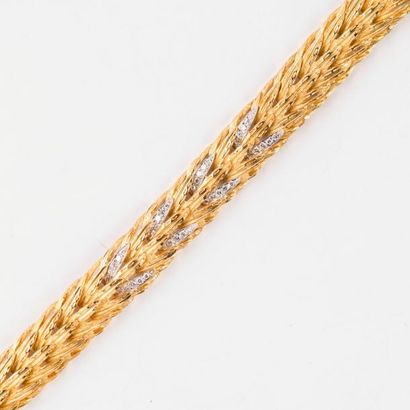 null Élégant bracelet stylisant des feuillages, en or jaune 18 carats (750 millièmes)...