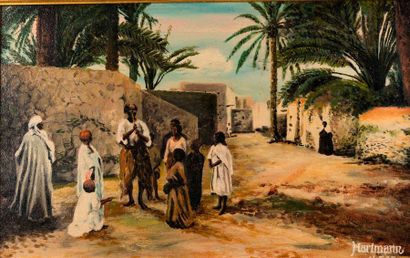 null HARTMANN (XXe). Village d'Afrique. Huile sur toile, signée en bas à droite....