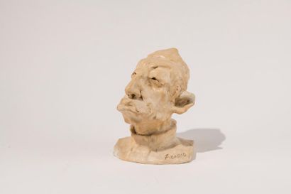 null AZARIO (XIX-XXe). Tête de personnage. Plâtre patiné, signé. H : 23 cm.