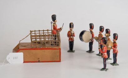 null Groupe de soldats anglais en plomb: 6 musiciens et 1 chef d'orchestre sur une...