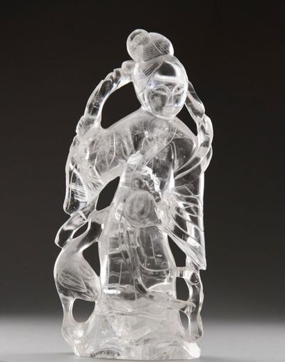null CHINE, XXème siècle. Statuette de Guanyin en cristal de roche
représentée debout,...