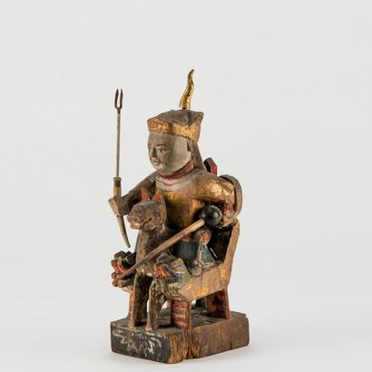 null CHINE DU SUD, XIXème-XXème siècle. Personnage royal sur un trône en bois sculpté...