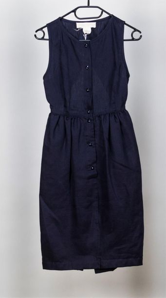 null CLAUDE MONTANA, circa 1990-95. Robe en toile de lin bleu marine emmanchures...