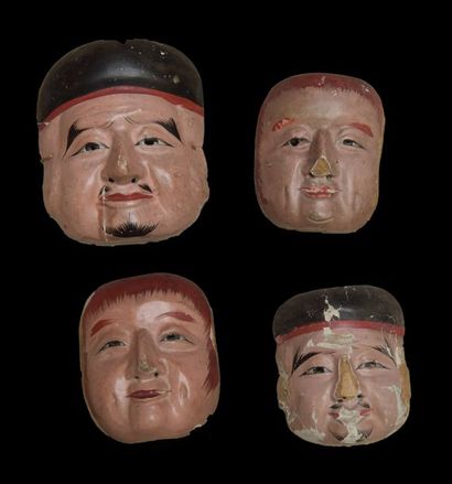 JAPON, lot de quatre masques en bois sculpté...