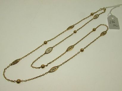 null 1 gold necklace with alternating filigree links of chains and gold pearls, humpbacked...