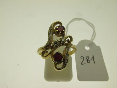 null 1 gold ring with openwork and movement set with two rubies (treated) and small...