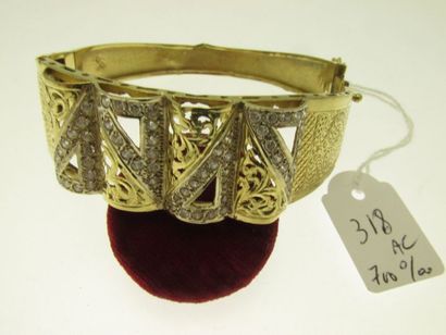 null 1 bracelet gold setting 700°/°° gold, chiselled, openwork and set with stones,...