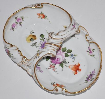 Oval white and gold porcelain bowl in the...