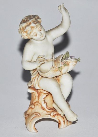 Three porcelain subjects, 1) young Bacchus...