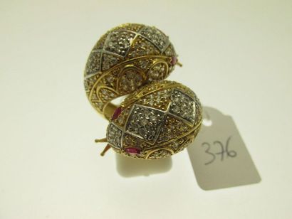 1 large two-tone gold ring decorated with...