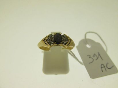 1 gold ring set with a sapphire (worn and...