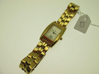  1 bracelet montre de dame GUESS boitier et bracelet métal doré, cadran acier, indexs...