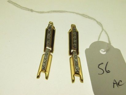 1 pair of articulated ear pendants, gold...