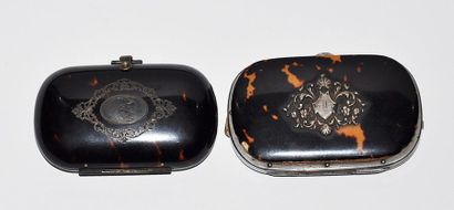 null Two tortoiseshell coin purses, 1) a slightly curved rectangular coin purse,...
