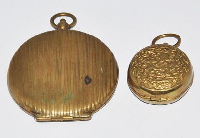 null Seven gold-plated or gold-lined metal slide-holders, five slightly domed rectangular...