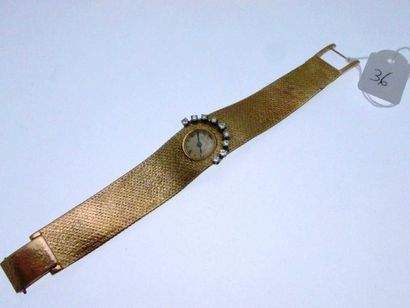 null 1 bracelet montre de dame JAEGER-LECOULTRE boitier et bracelet ruban or orné...