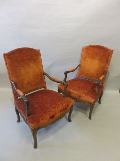FAUTEUIL Pair of armchairs in carved natural wood. Regency style. Red velvet uph...