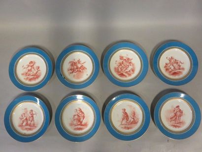null Huit assiettes en porcelaine à décor d'enfants et de putti, à bordure bleue...