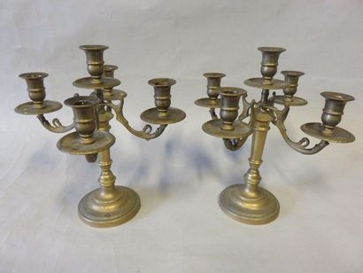 null Pair of gilded metal candleholders. 34x34 cm