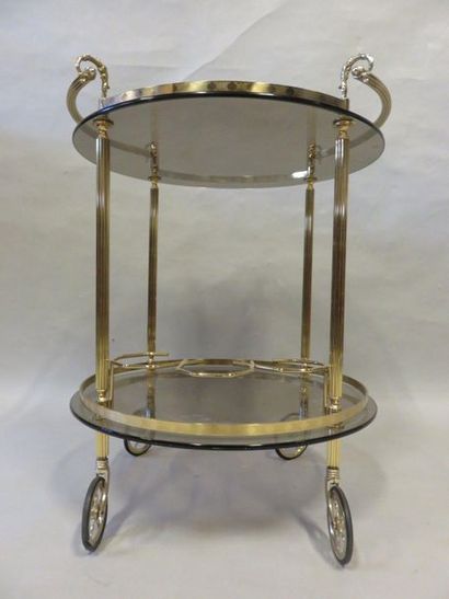 * Table roulante Rolling table with two smoked glass tops, brass frame. 73x58 cm