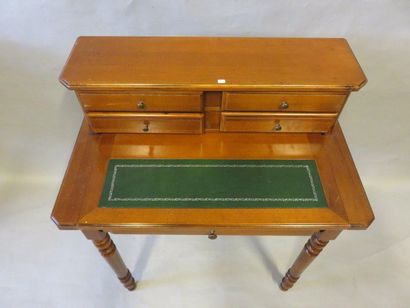 * Bureau Small stepped desk opening by five drawers and a shelf. Louis-Philippe style....