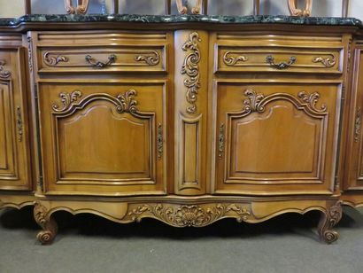 * Dining room furniture in carved fruitwood: four doors and two drawers, green marble...