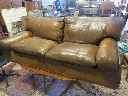 Canapé Brown leather two-seater sofa of the same model, forming a sofa bed. 75x195x95...
