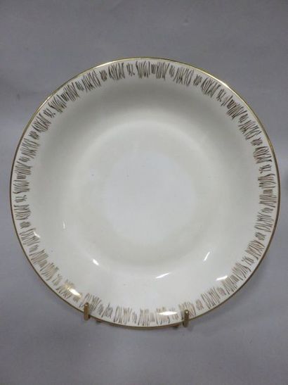 null White porcelain dinner and tea service with gold edging. 71 pieces.