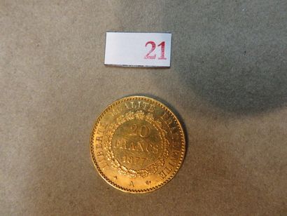 null Une pièce de vingt francs français en or de 1877 (6,4gr)