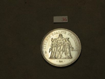 null Une pièce de cinquante francs en argent de 1975 (30gr)