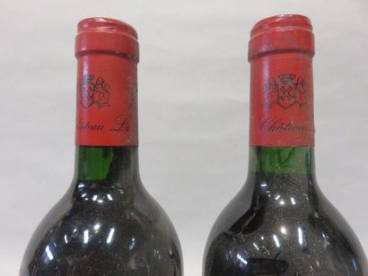 null Deux bouteilles Château La Croix Saint André, Lalande de Pomerol. 1983.