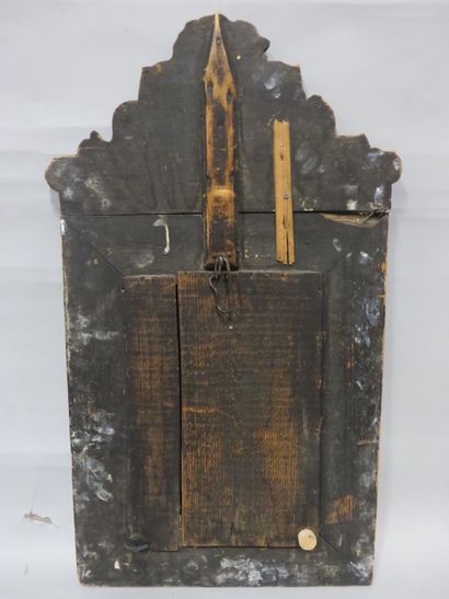 MIROIR Miroir à parcloses en bois et laiton repoussé. 69x41 cm
