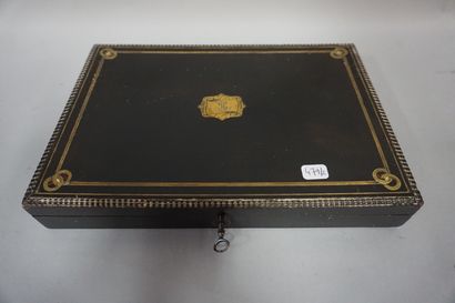 null Blackened wooden box with brass threads. 4x27x19 cm
