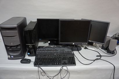 null Two Dell towers and two Dell screens and one Samsung screen.