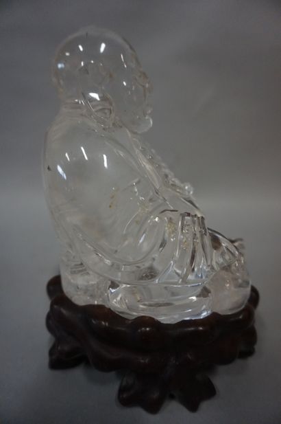 null Rock crystal Buddha (accidents). A wooden base, a crystal glass and a metal...