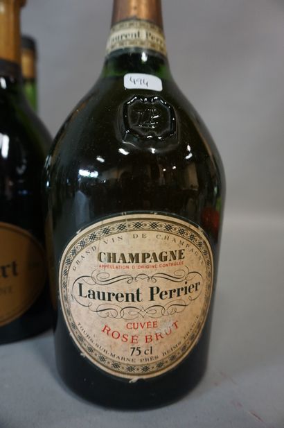 null Thirteen bottles: five champagnes (Ruinart, Laurent Perrier, Gissler), Cognac...