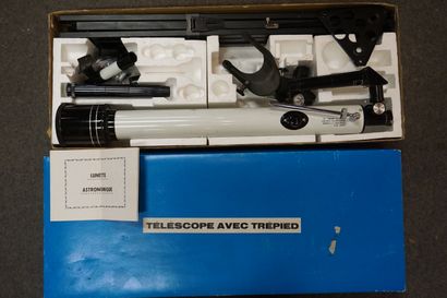 Astronomical telescope in its box.