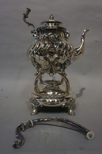null Tea fountain in silver plated metal (accident). 38 cm