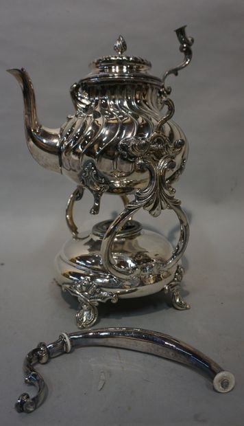 null Tea fountain in silver plated metal (accident). 38 cm