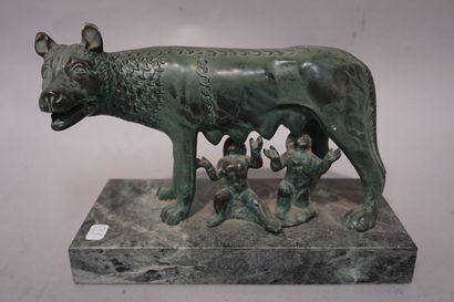null 
Capitoline she-wolf nursing Romulus and Remus in metal with green patina. 16x23x10...