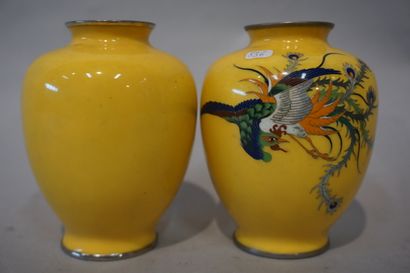 null Three Chinese vases: a yellow enamelled pair (12 cm) and one in red lacquer...