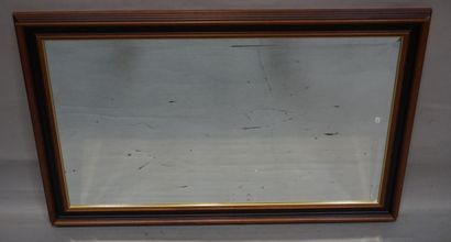 MIROIR Bevelled mirror with black and brown frame. 114x74 cm