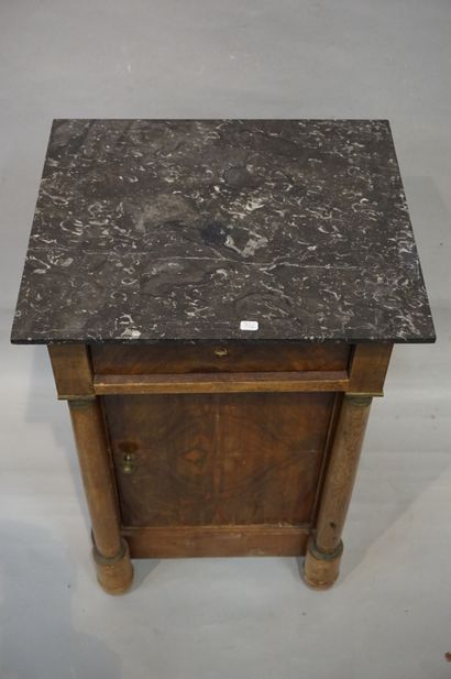 * Mahogany bedside table with detached columns, a door and a drawer. Grey marble...