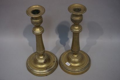 * Pair of gilded metal candle holders. 26 cm