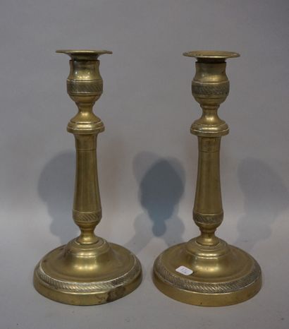 * Pair of gilded metal candle holders. 26 cm