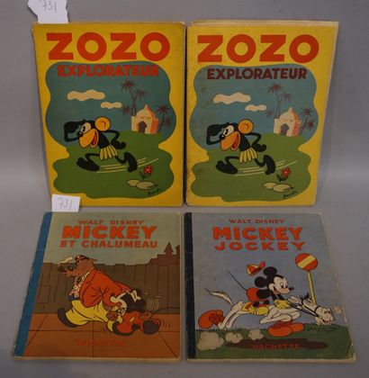 null Four children's albums: two Mickey and two Zozo.