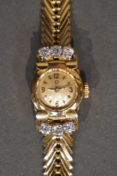 Montre Montre bracelet de dame en or OMEGA sertie de six diamants (poids Brut: 3...