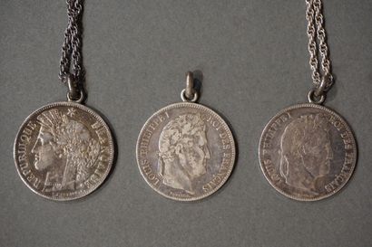 null Three French five francs silver coins with soldered suspension rings, and two...