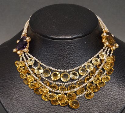 COLLIER 
Necklace of four rows of small pearls, decorated with citrines, and two...